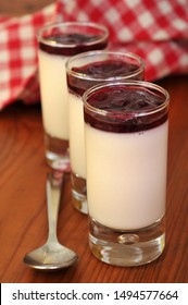 Homemade Panna Cotta In Verrines With A Strawberry Coulis