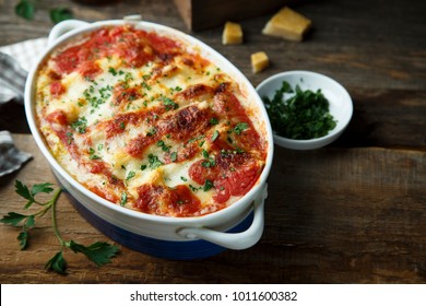 Homemade Pasta Bake With Cheese, Pesto And Tomato Sauce