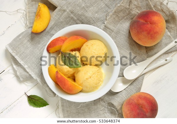 Homemade peach ice\
cream, sorbet, top\
view