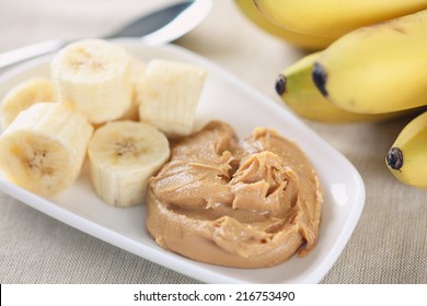 Homemade peanut butter and bananas. Homemade peanut butter ingredients:  peanuts (roasted, unsalted, shelled), peanut oil, honey. No salt, no sugar.