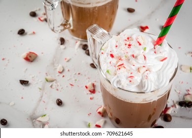 Homemade Peppermint Mocha, Christmas Coffee Drink With Candy Canes, Whipped Cream And Mint Syrup , On White Marble Table, Copy Space