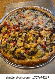 Homemade Philly Cheesesteak Pretzel Pizza American Cheese Monterey Jack Cheese Garlic Butter Crust