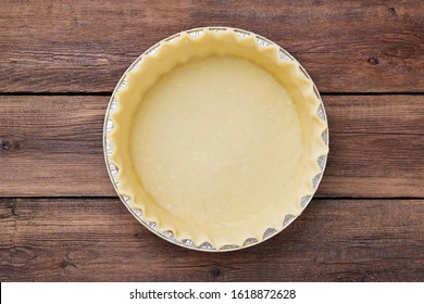 Homemade  pie preparation, empty pie  crust. top view - Shutterstock ID 1618872628