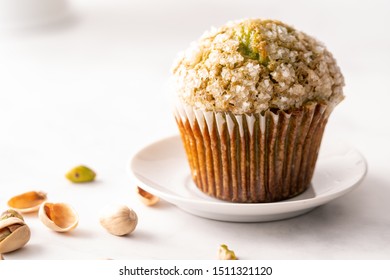 Homemade Pistachio Muffins With Sugar Crystals