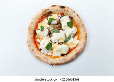 Homemade pizza with cream cheese and herbs. On a light background. Selective focus.