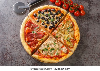 Homemade pizza four seasons with tomatoes, mozzarella, mushrooms, artichokes, ham and olives close-up on the table. Horizontal top view from above - Shutterstock ID 2238604689