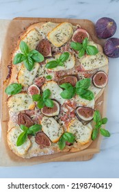 Homemade Pizza With Italian Meat, Cheese, Figs, Arugula, And Honey