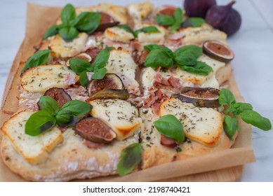 Homemade Pizza With Italian Meat, Cheese, Figs, Arugula, And Honey