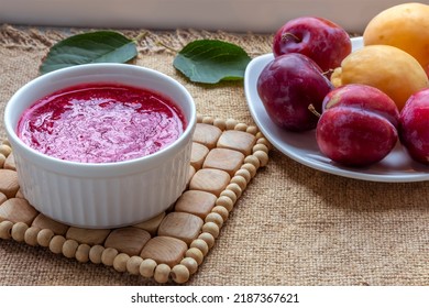 Homemade Plum Jam Preparation. Boiling , Crimson, Transparent Jam