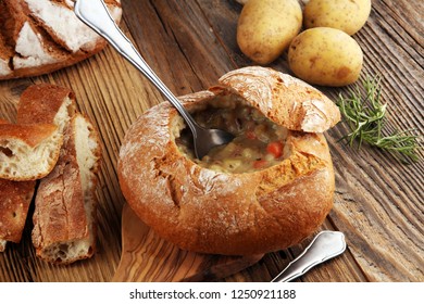 Homemade Potato Cream Soup, Served In Bread Bowl