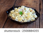 Homemade potato salad with sausages	