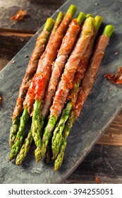 Homemade Prosciutto Wrapped Asparagus with Salt and Pepper - Shutterstock ID 394255051