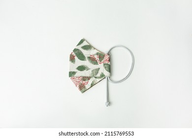 Homemade Protective Mask And Pieces Of Cloth On A With Background