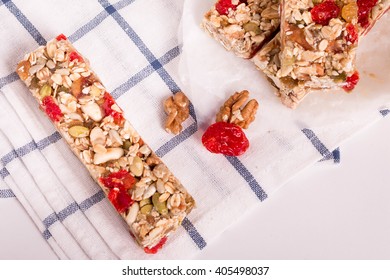 Homemade Protein Bars. Granola Bar With Nuts And Dry Fruits On White Background.