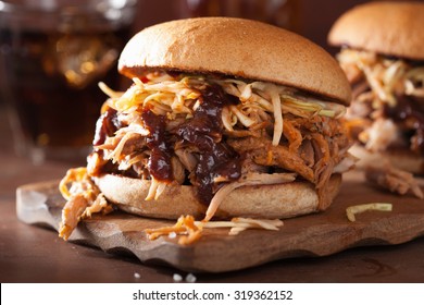 homemade pulled pork burger with coleslaw and bbq sauce