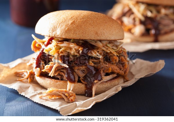 homemade\
pulled pork burger with coleslaw and bbq\
sauce