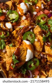 Homemade Pulled Porrk Nachos With BBQ Sauce And Cheese