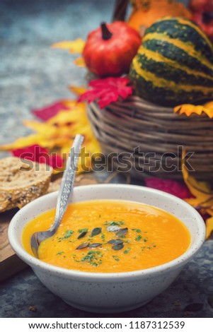 Similar – Foto Bild Kürbissuppe in weißer Schüssel und Zutaten auf Holztisch