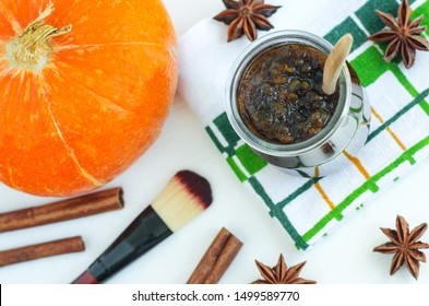 Homemade Pumpkin Spice Facial Mask (scrub) Made With Ripe Pumpkin Puree, Sugar And Honey, Cinnamon Powder And Ground Coffee. DIY Cosmetics Recipe. Copy Space. 