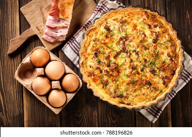 Homemade quiche lorraine with bacon and cheese. French cuisine