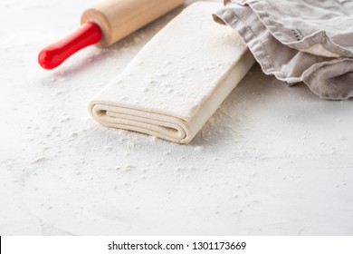 Homemade Raw Puff Pastry On A White Background.