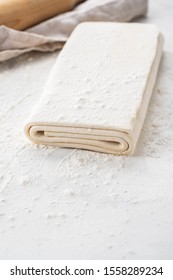 Homemade Raw Puff Pastry On A White Background.