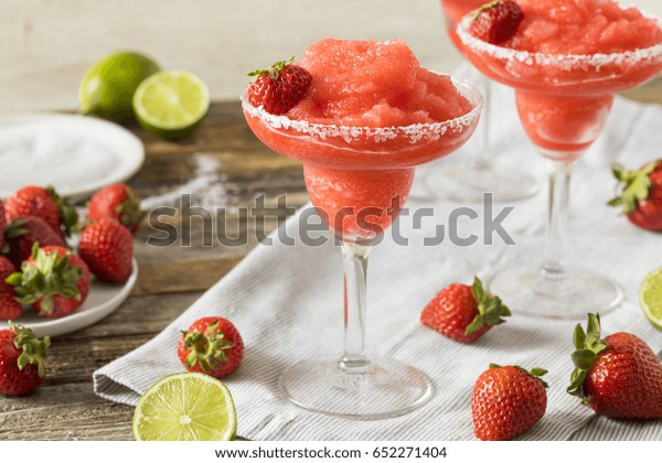 Homemade Red\
Frozen Strawberry Margarita in a\
Glass