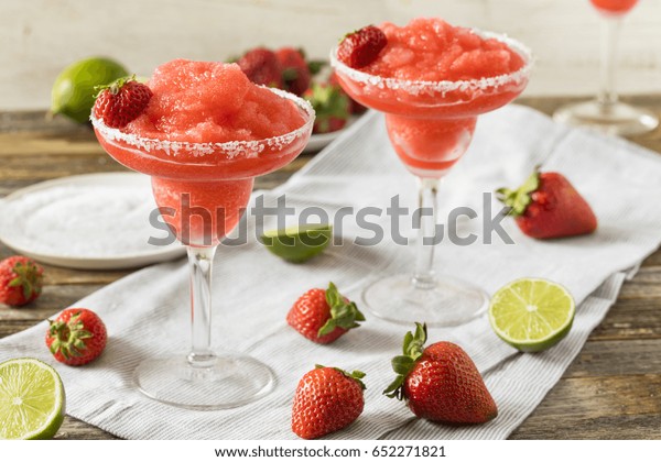 Homemade Red\
Frozen Strawberry Margarita in a\
Glass