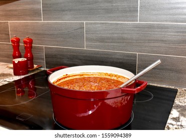 Homemade Red Pasta Sauce Simmering On Stove For Family Dinner
