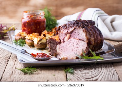 Homemade Rib-eye Boneless Roast Beef With Stuffed Mushrooms On Baking Sheet 