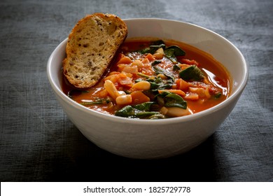 Homemade Ribollita, tuscan bean soup with seed & grains sourdough