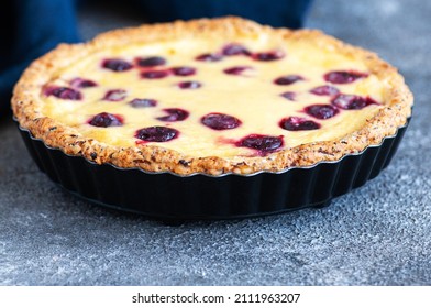 Homemade Ricotta Cheese Pie With Cherries On A Gray Background. Close Up. Hearty Baking.