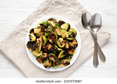 Homemade Roasted Brussel Sprouts On A Plate, Top View. Flat Lay, Overhead, From Above.