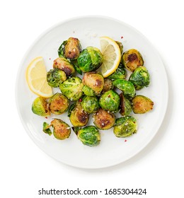 Homemade roasted brussel sprouts with parmesan cheese and butter sauce isolated on white background
