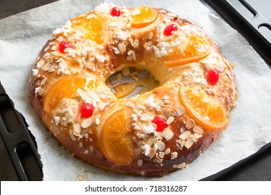 Homemade "Roscon de reyes" , Spanish typical dessert of Epiphany, in the oven plate