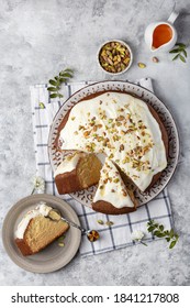 Homemade Round Sponge Hot Milk Cake With Buttercream And Pistachios