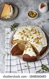 Homemade Round Sponge Hot Milk Cake With Buttercream And Pistachios