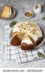 Homemade Round Sponge Hot Milk Cake With Buttercream And Pistachios