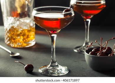 Homemade Rye Bourbon Manhattan with a Cherry Garnish
