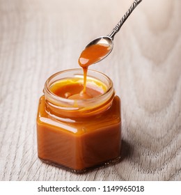 Homemade Salted Caramel Sauce In A Glass Jar 