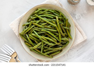 Homemade Sauteed Green Beans On A Plate, Top View. Flat Lay, Overhead, From Above.