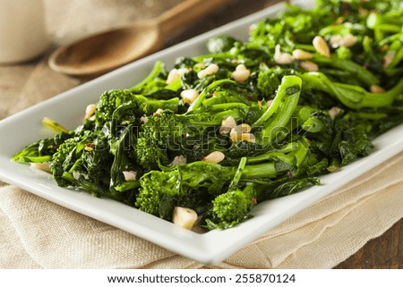 Homemade Sauteed Green Broccoli Rabe with Garlic and Nuts Foto stock © 