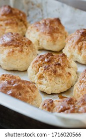 Homemade scones whit honey on waxed paper. Copy space.
 - Shutterstock ID 1716020566