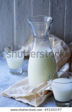 Homemade serum in a Pitcher in rustic style
