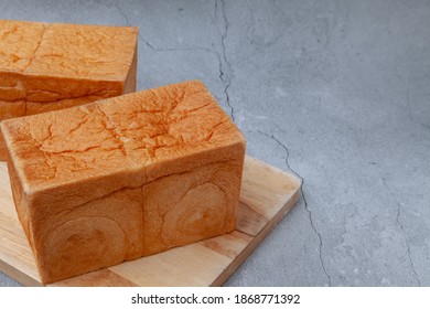 Homemade Shokupan, the Japanese bread loaf on cement background. - Shutterstock ID 1868771392
