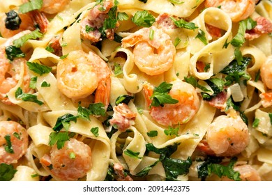 Homemade Shrimp Spinach Bacon Alfredo On A Plate, Top View. Flat Lay, Overhead, From Above. Close-up.