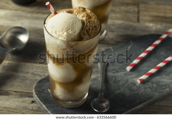 Homemade Soda\
Black Cow Ice Cream Float with a\
Straw