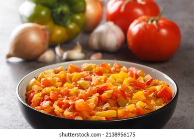 Homemade Sofrito Sauce From Peppers, Tomatoes, Garlic And Onions Close-up In A Plate On The Table. Horizontal
