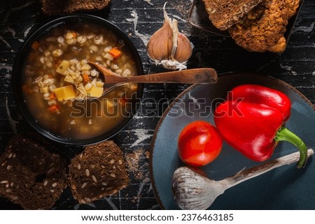 Homemade soup- dark photo. Background food- still life nosh. Serving meals in the home kitchen