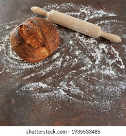 Homemade Sourdough Bread With, Rolling Pin And Spilled Flour